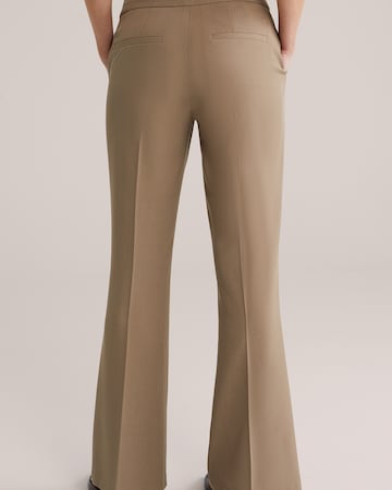 WE Fashion Flared Pressveckad byxa i grå