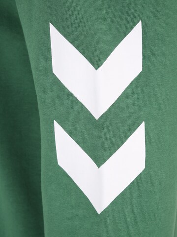 Hummel Urheilullinen collegepaita värissä vihreä