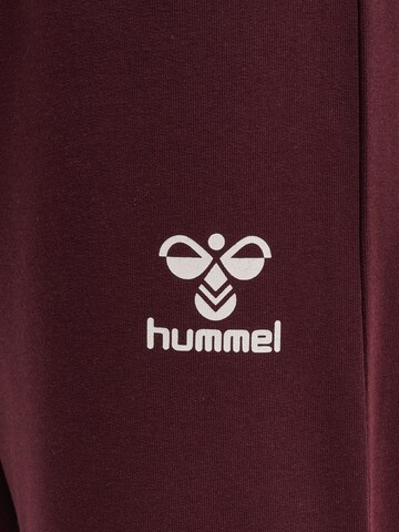 Effilé Pantalon de sport 'Bagga' Hummel en rouge