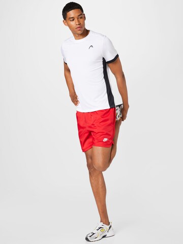 Nike Sportswear Normalny krój Spodnie 'Essentials' w kolorze czerwony
