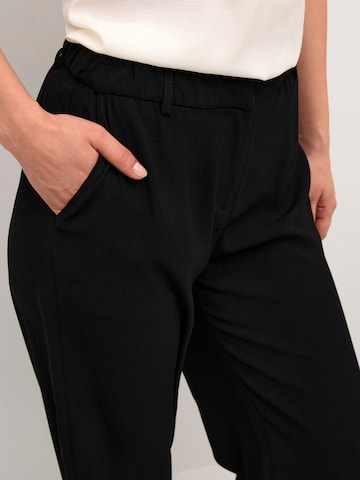 Cream Loose fit Chino Pants 'Cocamia' in Black