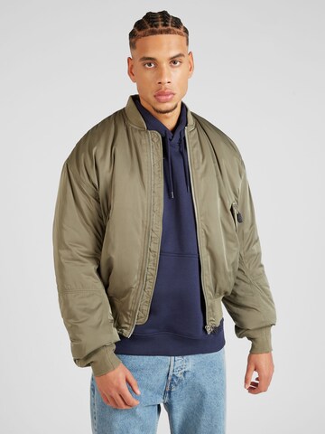 Veste mi-saison 'Jon' WEEKDAY en vert : devant