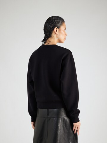 GUESS Sweatshirt in Schwarz