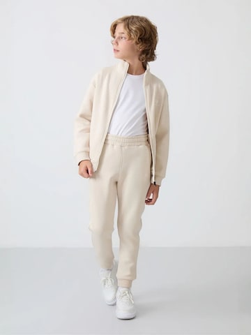Tommy Life Trainingsanzug 'TOMMY Kinder Active Set'‌‌‌ in Beige