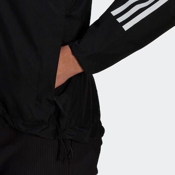 ADIDAS SPORTSWEAR Куртка в спортивном стиле 'Bsc 3-Stripes Rain.Rdy' в Черный