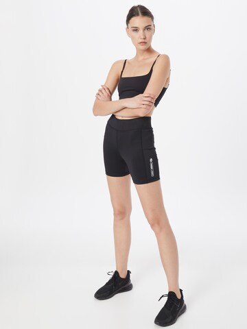 Skinny Pantalon de sport 'GG12' Hummel en noir