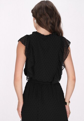 Camicia da donna di faina in nero
