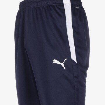 PUMA Slimfit Sportbroek in Blauw