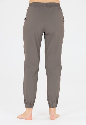 Athlecia Tapered Sporthose 'Hero' in Braun
