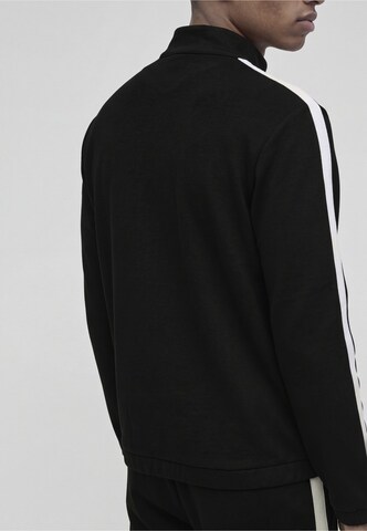 Completo per l'allenamento di Sergio Tacchini in nero: lato