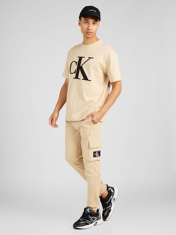 Calvin Klein Jeans Дънки Tapered Leg Карго панталон в бежово