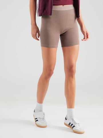 ADIDAS ORIGINALS - Skinny Leggings 'ESS' em castanho: frente