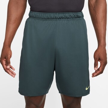 NIKE Regular Workout Pants in Blue: front