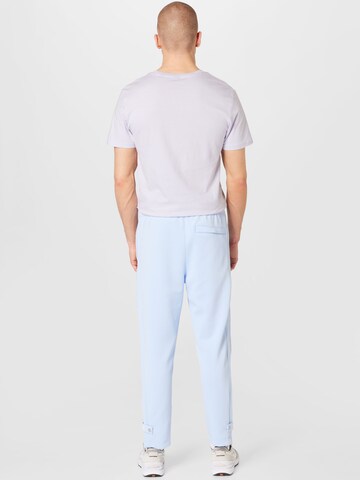 Nike Sportswear Regular Trousers in Blue