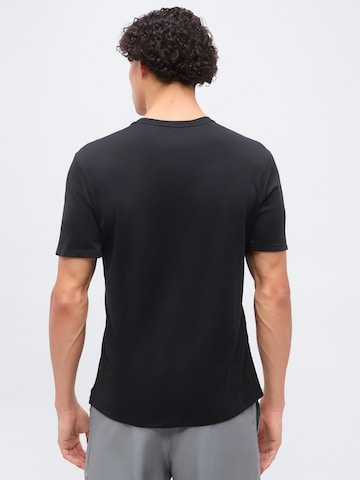 T-Shirt fonctionnel 'MILER' NIKE en noir