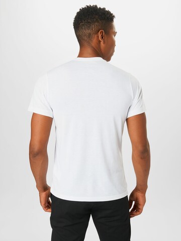 Coupe regular T-Shirt fonctionnel NIKE en blanc