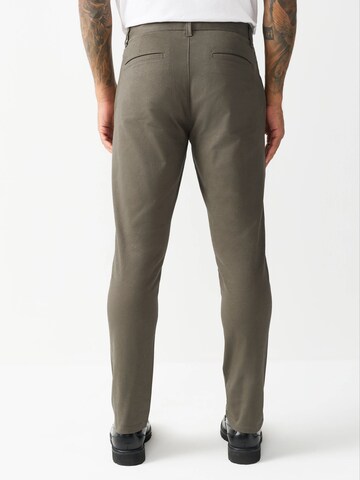 Next - Slimfit Calças chino em castanho