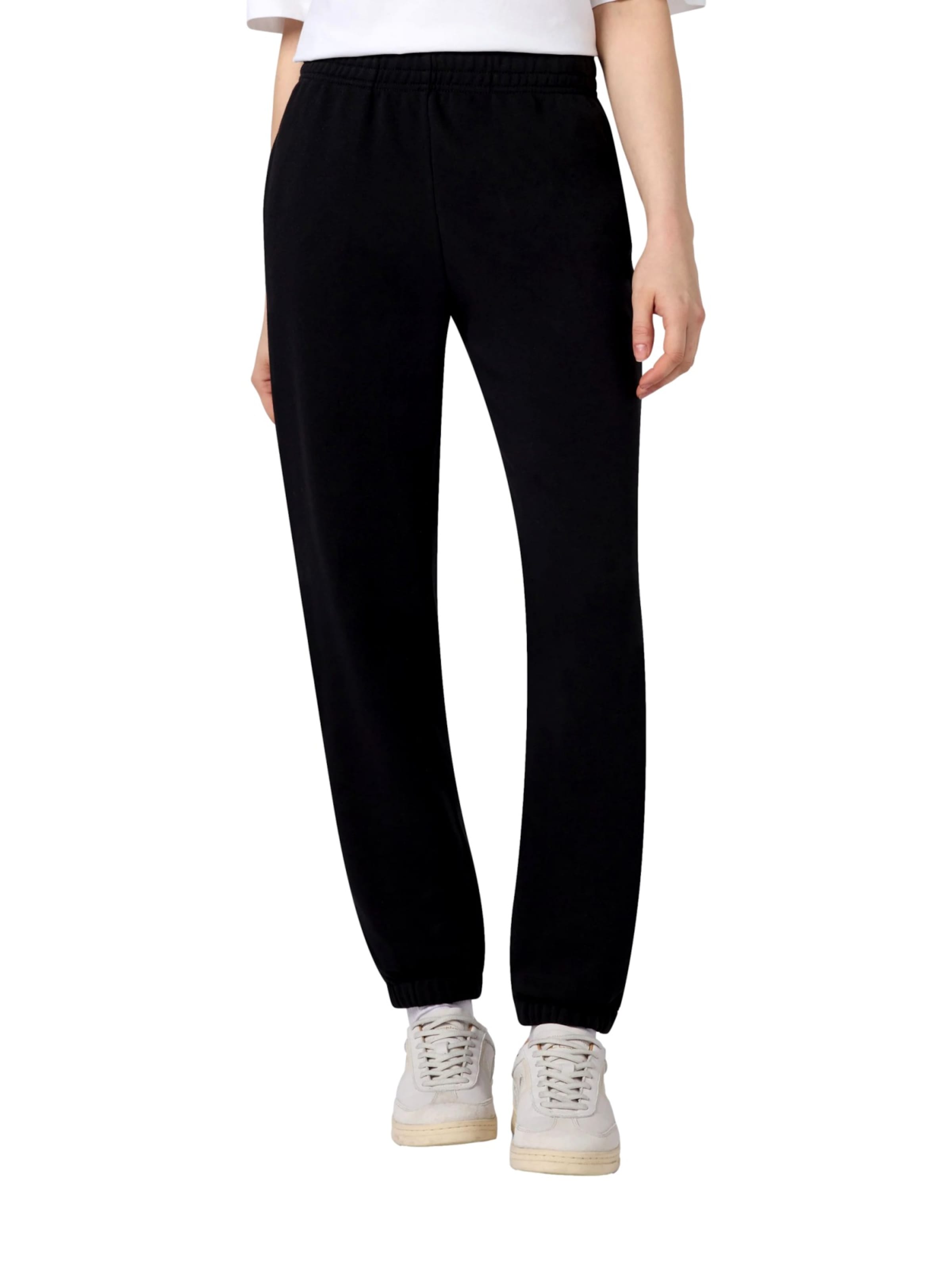 Regular Pantalon de sport Champion en noir : devant