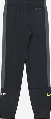 Nike Sportswear - Tapered Pantalón 'AIR' en negro