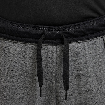 NIKE Skinny Workout Pants in Grey