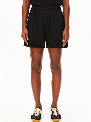 ARMEDANGELS Loose fit Trousers in Black: front