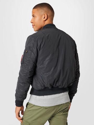 Veste mi-saison ALPHA INDUSTRIES en noir