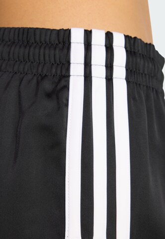 Loosefit Pantaloni 'Sprinter' di ADIDAS ORIGINALS in nero
