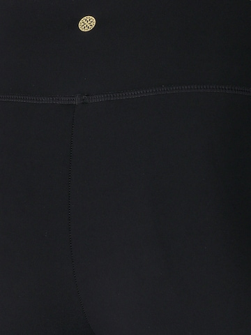 Athlecia Skinny Urheiluhousut 'Comaya' värissä musta