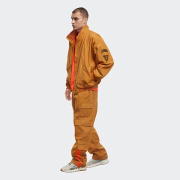 ADIDAS ORIGINALS Übergangsjacke 'Ivy Park' in Orange