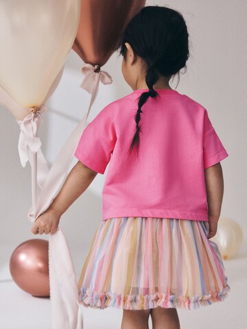 Set Next en rose