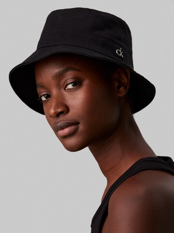 Chapeaux 'Reversible' Calvin Klein en noir