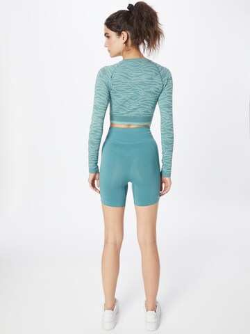 Hummel Skinny Sportbroek 'Tif' in Groen