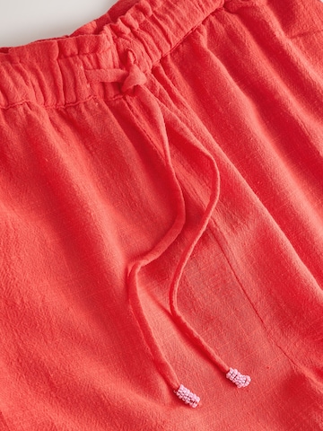 Wide leg Pantaloni di Next in rosso