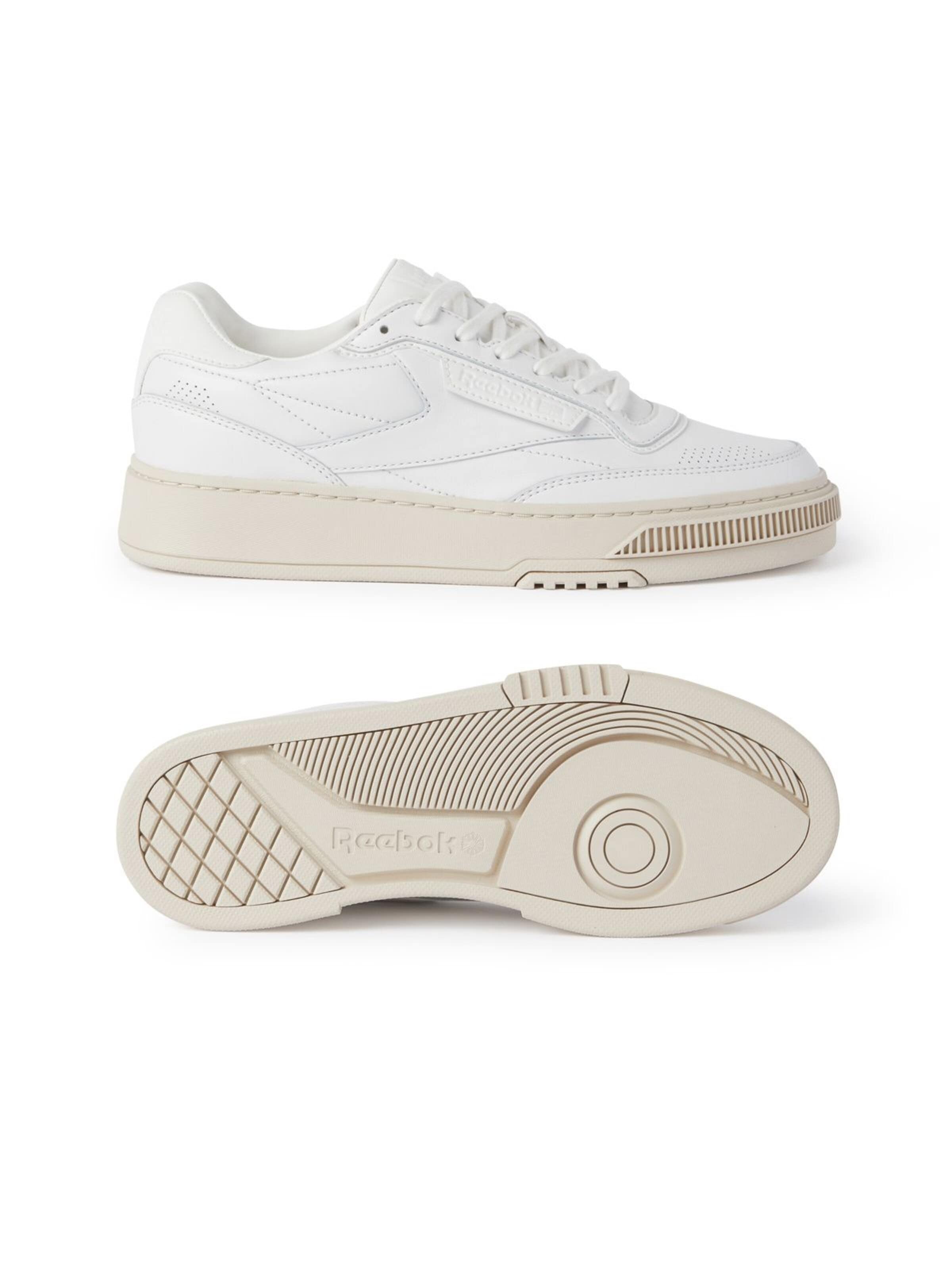 Reebok - Zapatos con cordón en blanco