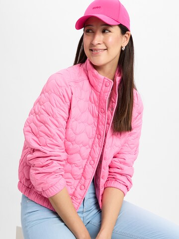 Marie Lund Tussenjas ' ' in Roze