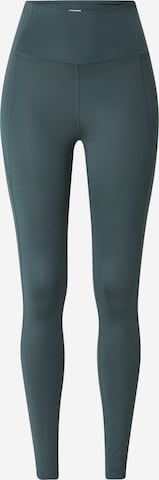 Girlfriend Collective Skinny Workout Pants in Green: front