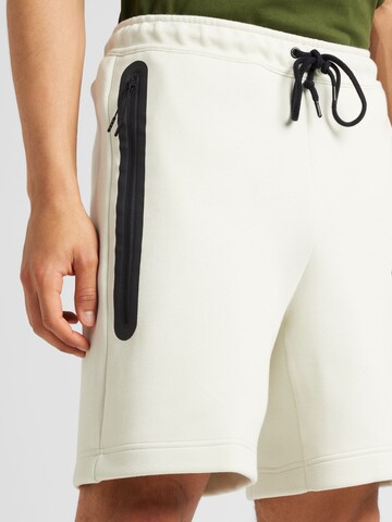 Nike Sportswear Loose fit Pants in Grey