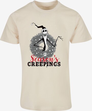 ABSOLUTE CULT T-Shirt 'The Nightmare Before Christmas - Seasons Creepings Wreath' in Beige: predná strana