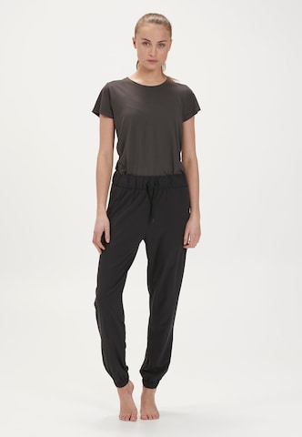 Athlecia - Tapered Pantalón deportivo 'Austberg' en negro