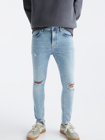 Skinny Jeans de la Pull&Bear pe albastru: față