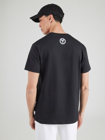 Tricou de la Carlo Colucci pe negru: spate