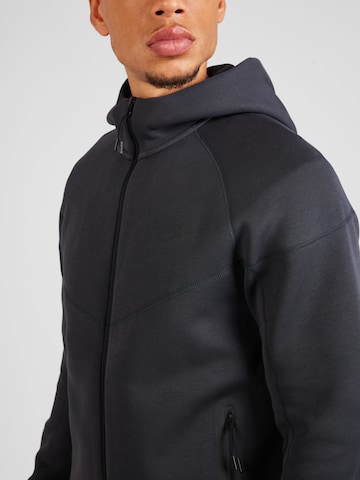 Nike Sportswear - Casaco em moletão 'TCH FLC' em cinzento
