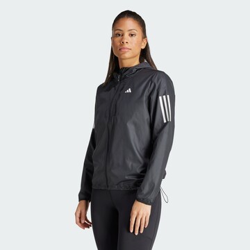 Geacă sport 'Own The Run' de la ADIDAS PERFORMANCE pe negru: față