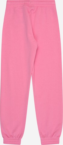Champion Authentic Athletic Apparel Tapered Broek in Roze