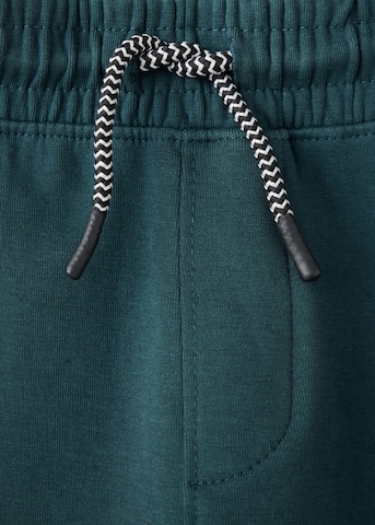 MANGO KIDS Tapered Byxa 'ZIPSETC' i grön