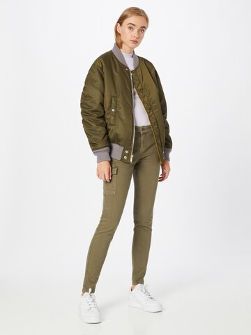 Coupe slim Pantalon cargo Cartoon en vert