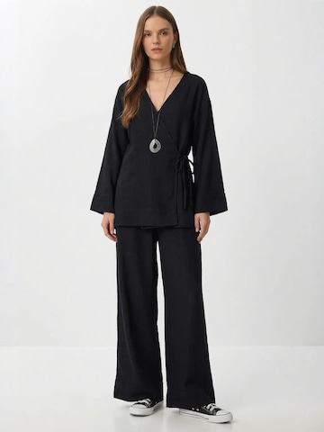 Pantalons de tailleur Happiness İstanbul en noir : devant
