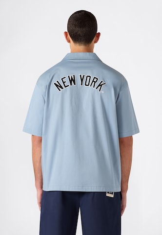 Champion - Ajuste confortable Camisa en azul