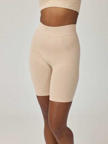 SNOCKS Shaping Pants in Beige: front