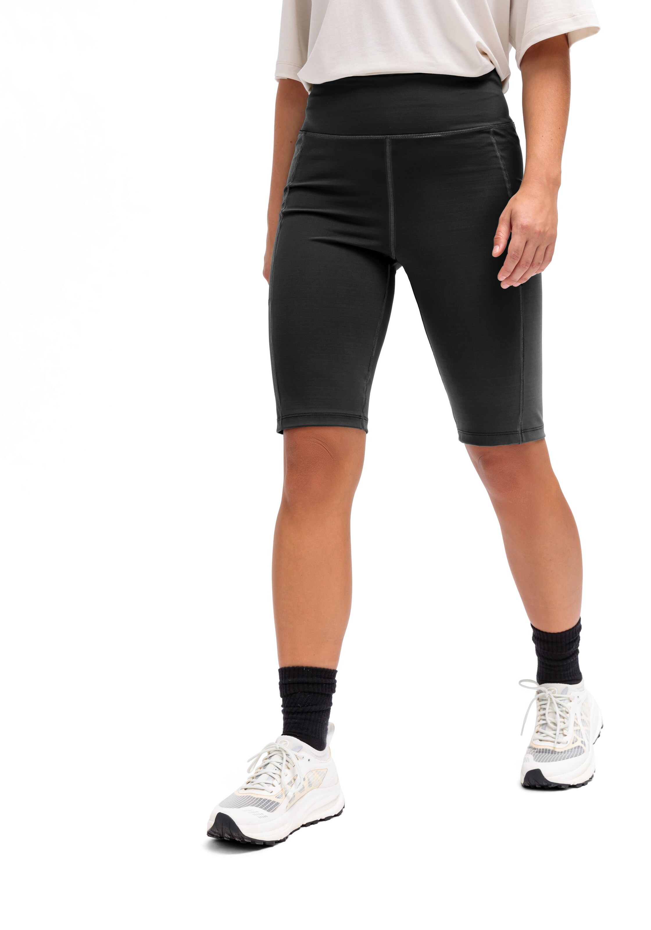 Maier Sports Skinny Workout Pants in Black: front